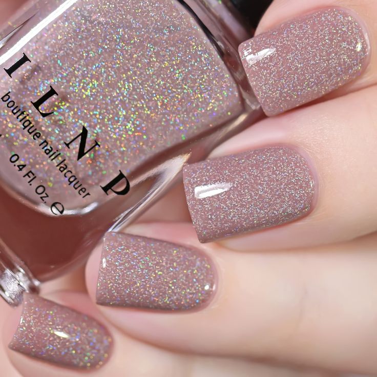 Elegant Shimmering Nude Nail Design with Holographic Glitter for All Occasions