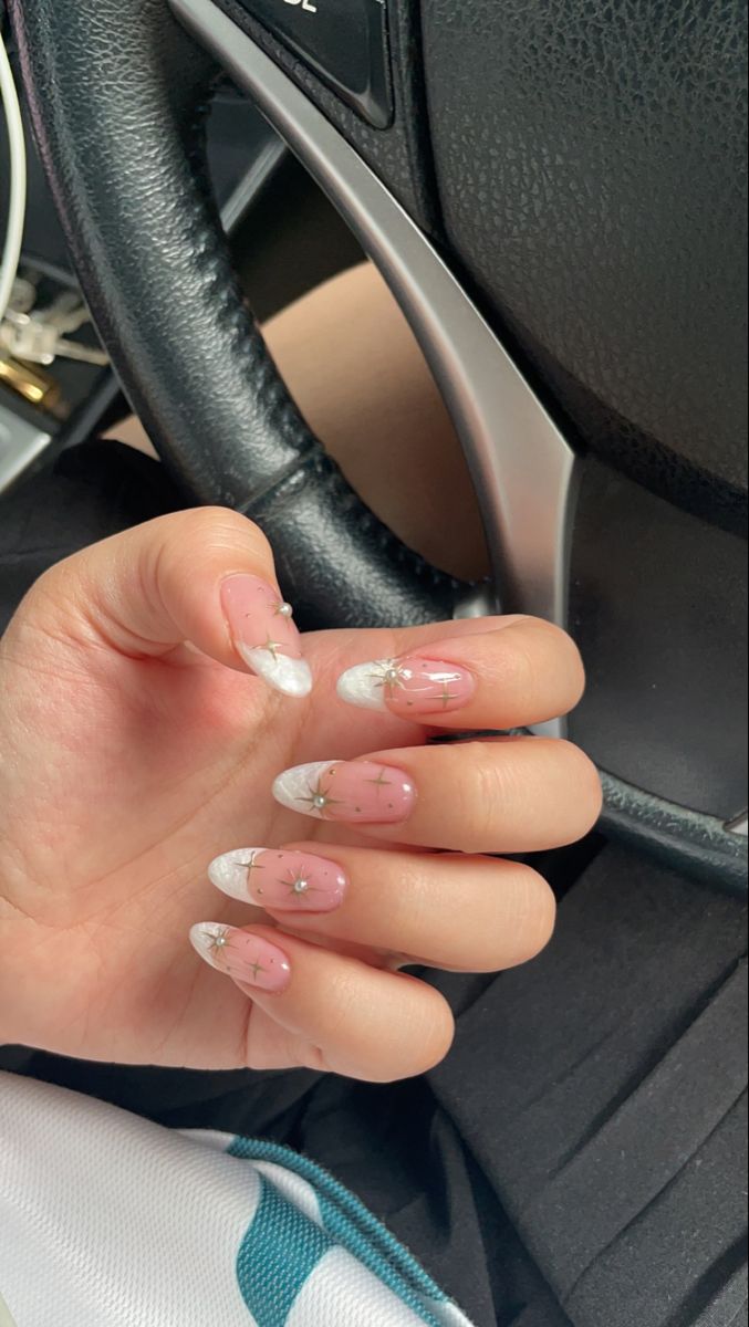 Sophisticated Soft Pink and Glossy White Gradient Nail Design with Silver Accents