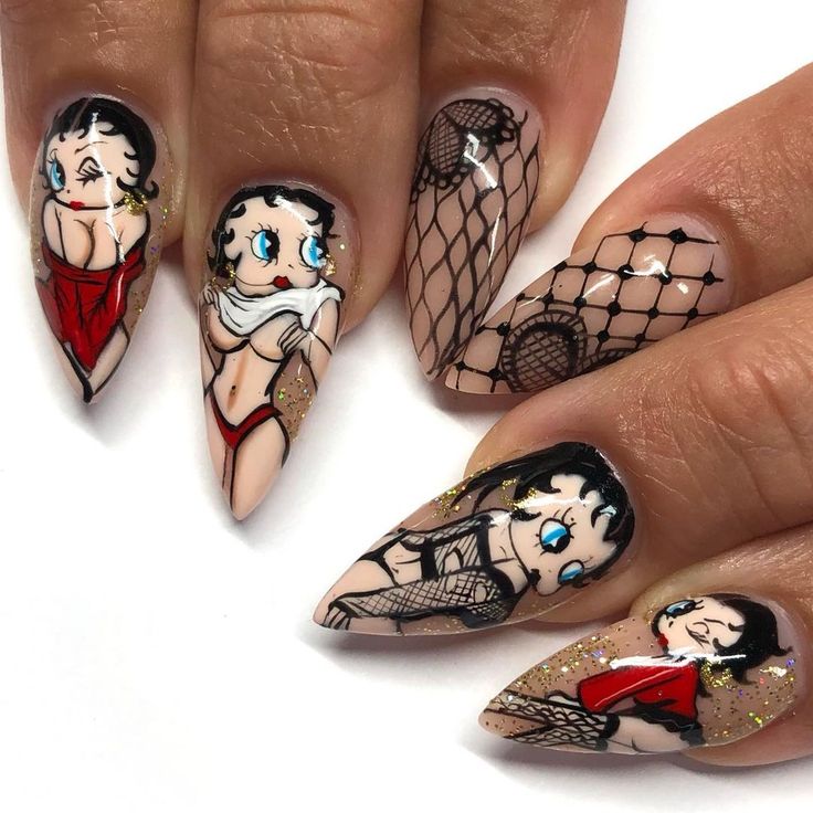 Playful Cartoon Character Nail Designs with Bold Patterns and Shimmering Accents.