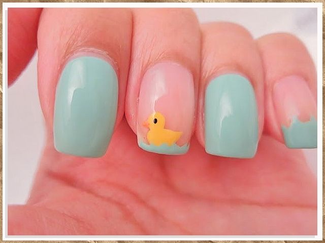 Whimsical Spring-Inspired Nail Design with Mint Green, Pastel Pink Accents, and a Playful Duckling.