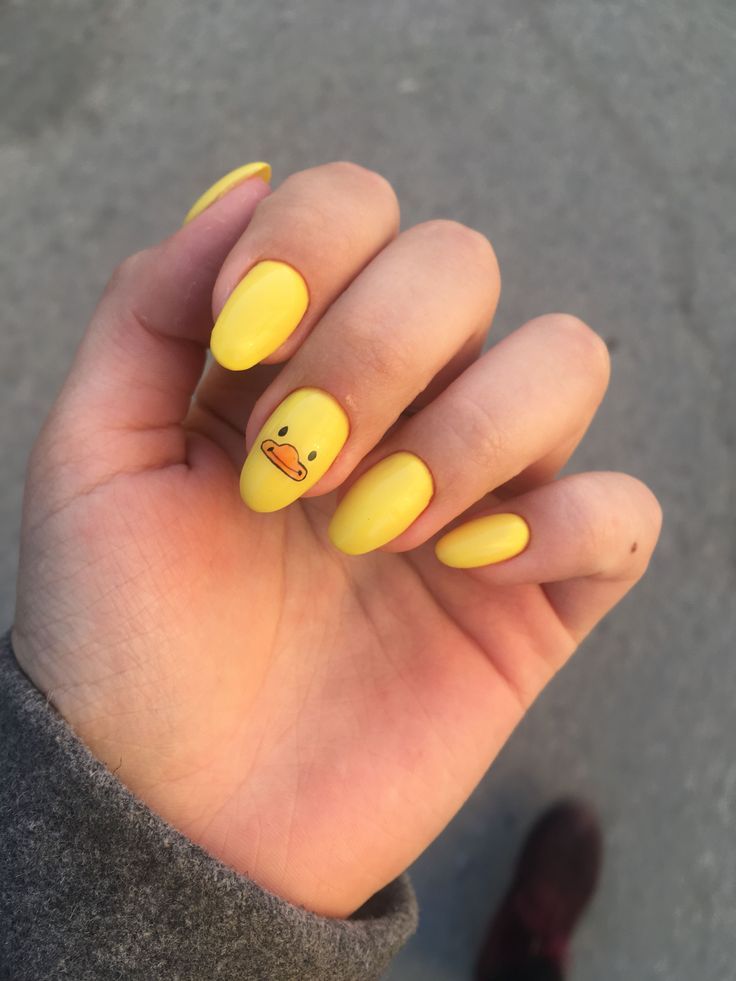 Playful Duck Design on Vibrant Yellow Nails for a Cheerful Summer Look.