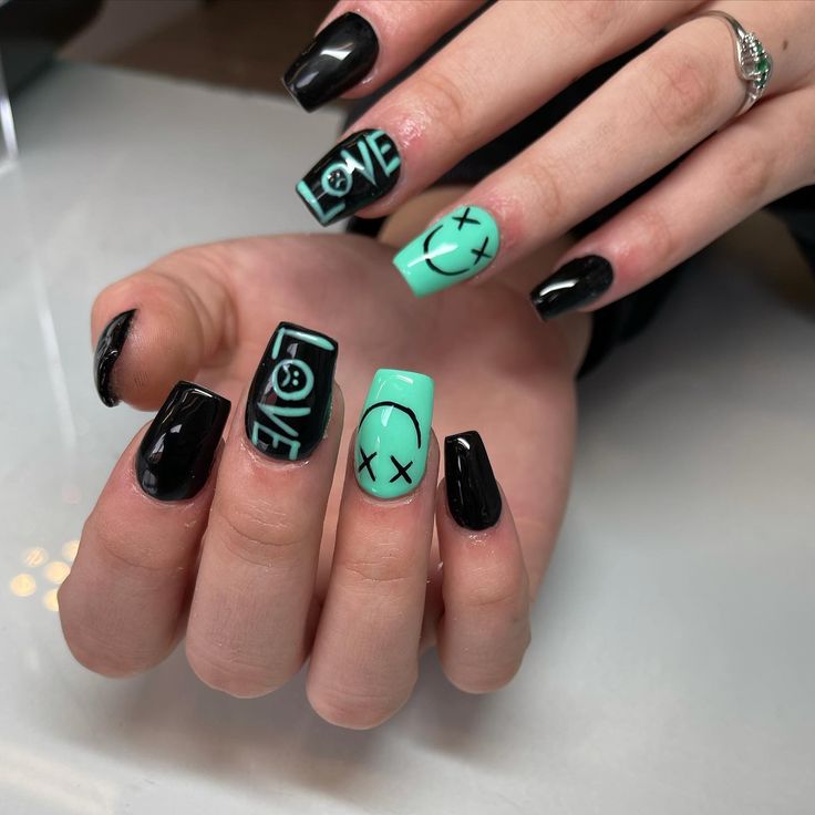 Playful Black and Mint Green Nail Design: A Bold Expression of Personal Style