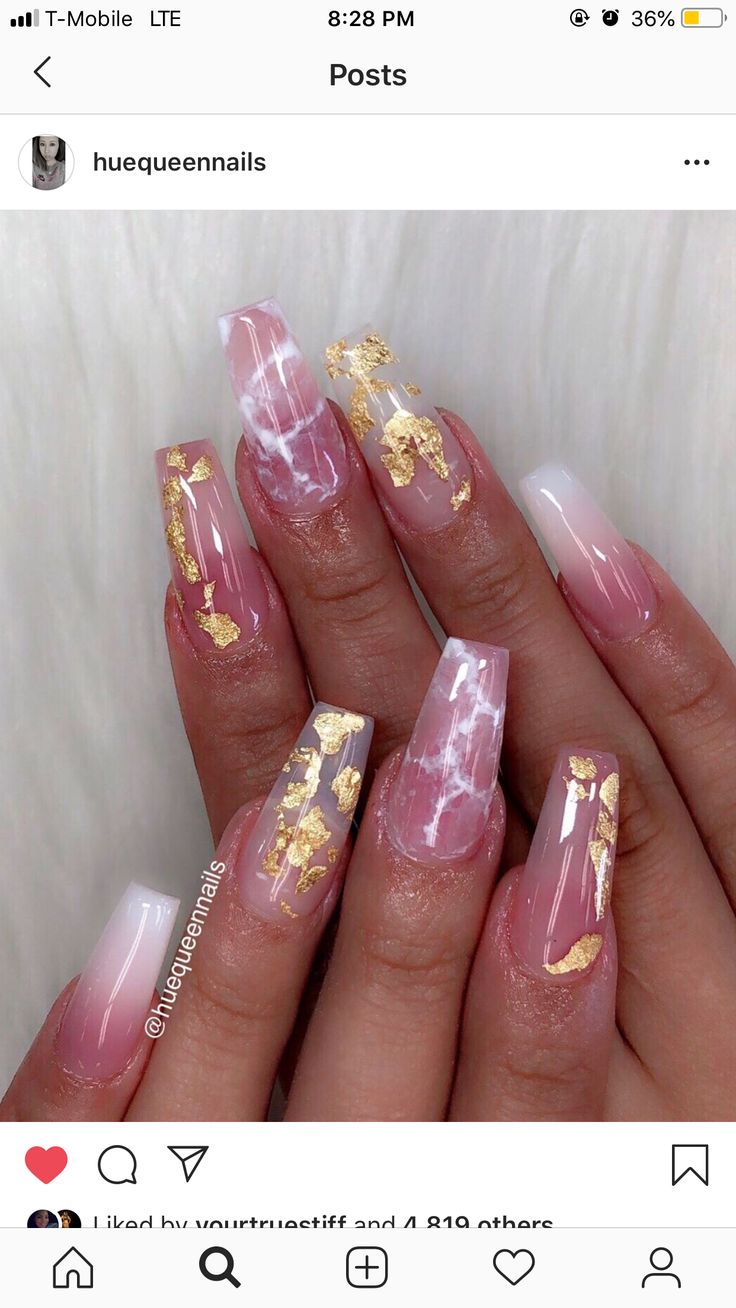 Elegant Pink and White Ombre Nail Art with Marble Designs and Gold Flakes