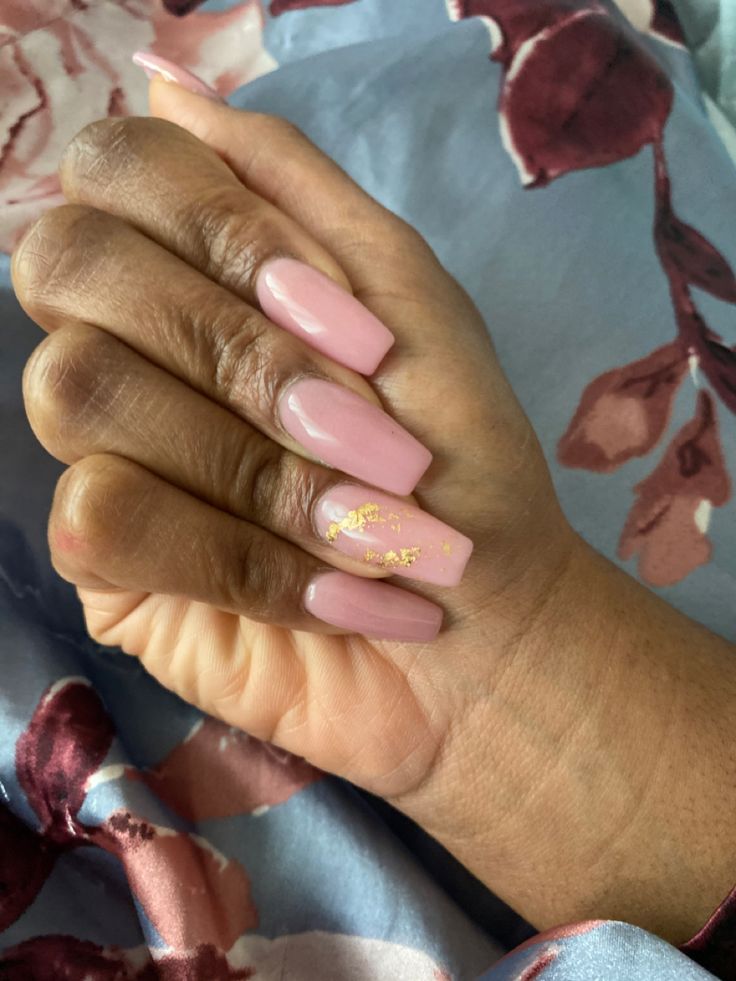 Sophisticated Chic: Elegant Soft Pink Nail Design with Gold Accent.