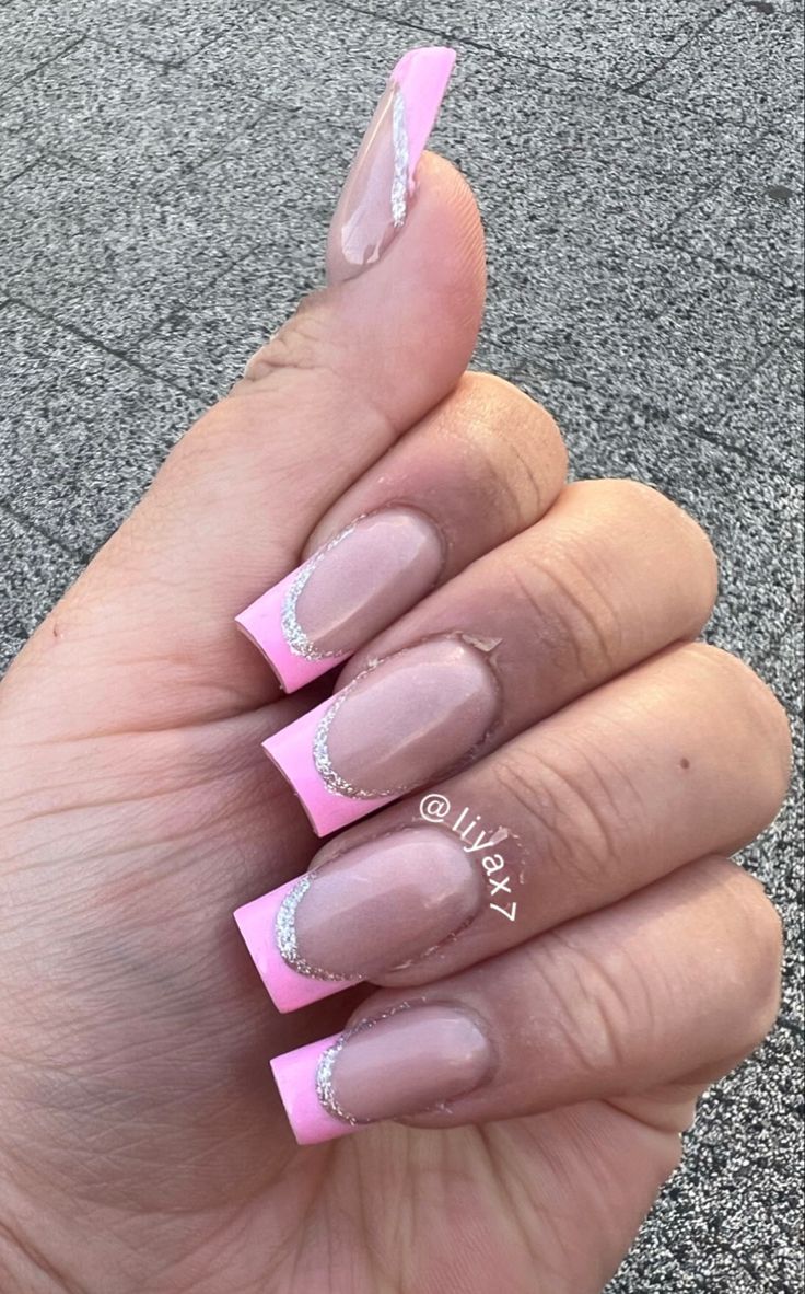 Chic Square Nail Design: Soft Pink Tips with Nude Base and Elegant Silver Accents.