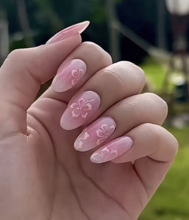 Elegant Floral Nail Design with Soft Pink Base for a Feminine Spring Aesthetic