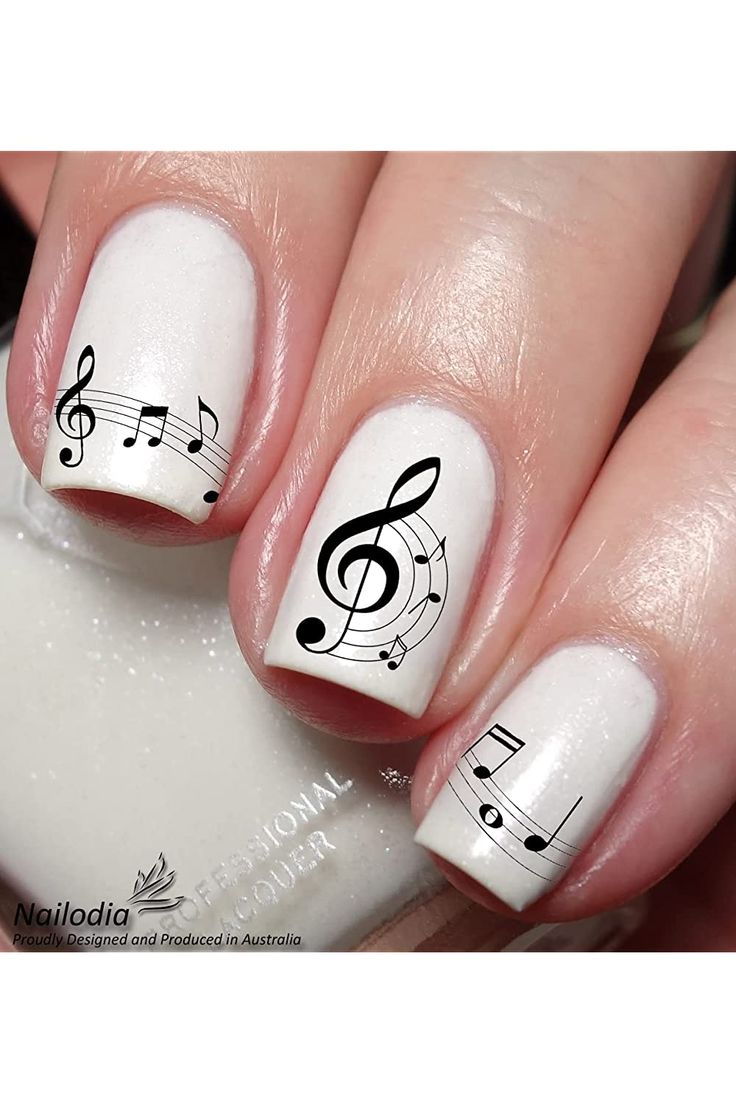 Elegant Musical Nail Design with Black Notes on Soft White Background