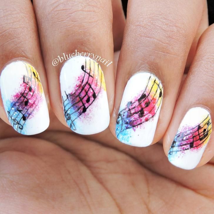 Colorful Musical Notes Nail Design with Abstract Watercolor Effect