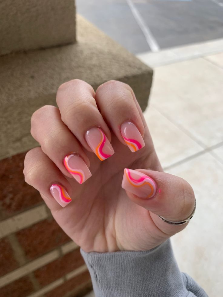 Playful Pink and Orange Swirl Nail Design for a Chic, Colorful Look