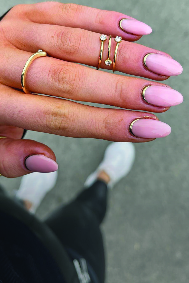 Elegant Almond-Shaped Nails with Soft Pink and Metallic Gold Accents.