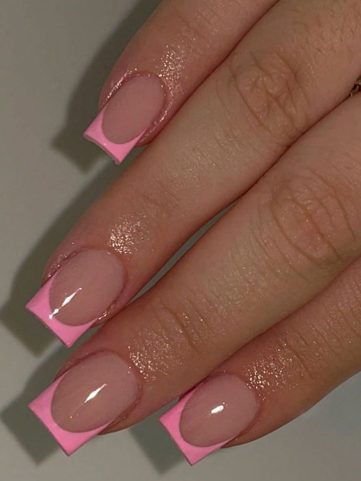 Chic Clear Base Nails with Playful Pink Tips for a Trendy Modern Look.