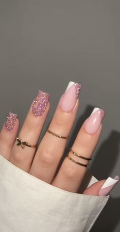 Chic Glamorous Nail Design with Soft Pink, Glitter Accents, and Elegant Accessories