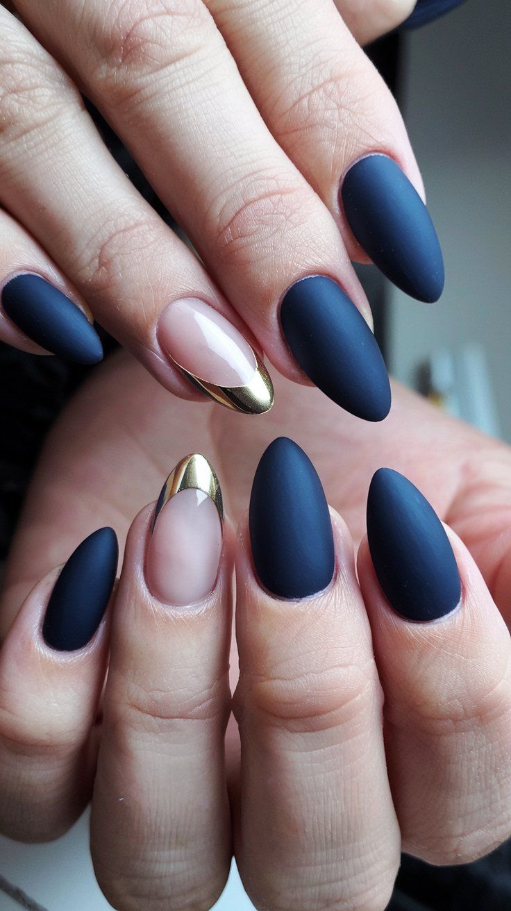 Sophisticated Almond-Shaped Nail Design with Matte Navy Blue and Glossy Gold Accents