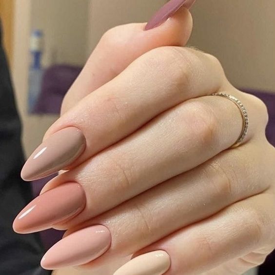 Elegant Almond-Shaped Nails with Soft Nude and Muted Pink Gradient