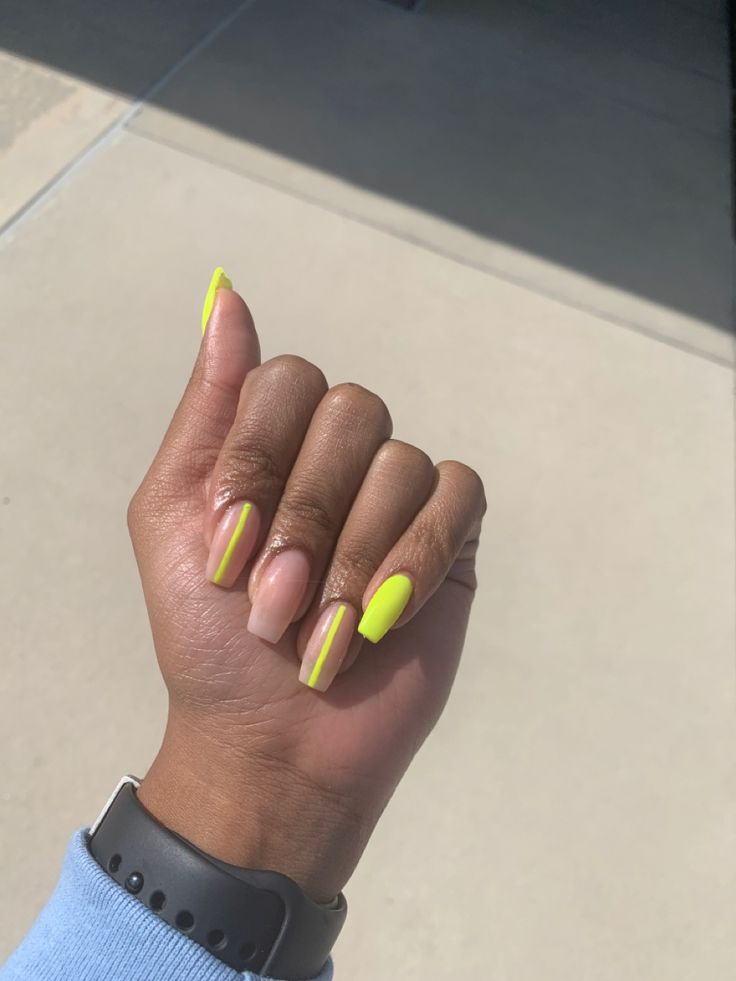 Bold Neon Yellow and Nude Nail Design with Glossy Finish and Clean Lines