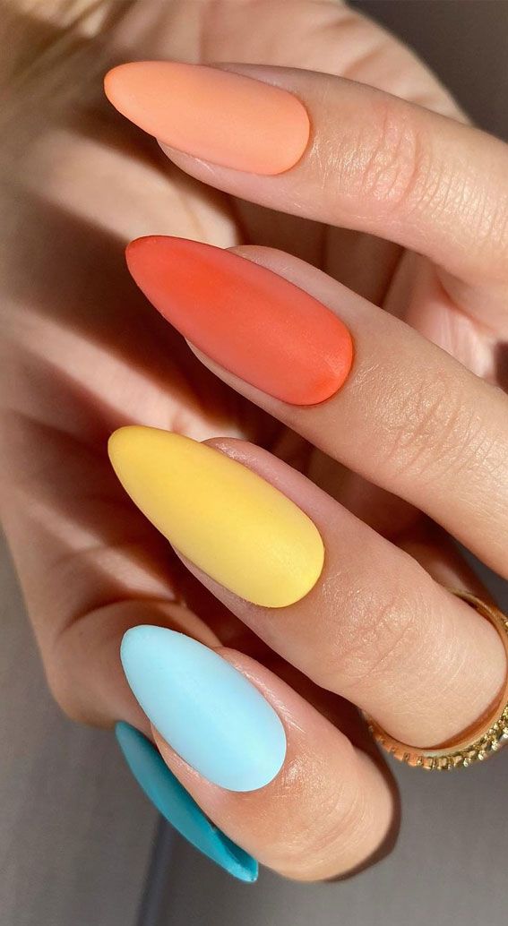 Vibrant Pastel Nail Design: Sleek Pointed Shape with Bold Gradient Colors and Modern Matte Finish.