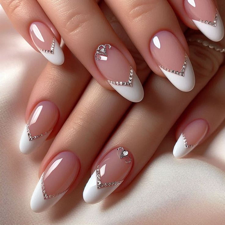 Chic French Tip Nails with Rhinestones: A Romantic Touch for Any Occasion.