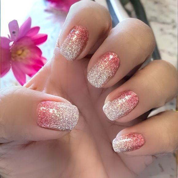 Elegant Glittery Ombre Nail Design with Pink-Silver Gradient and Floral Accents