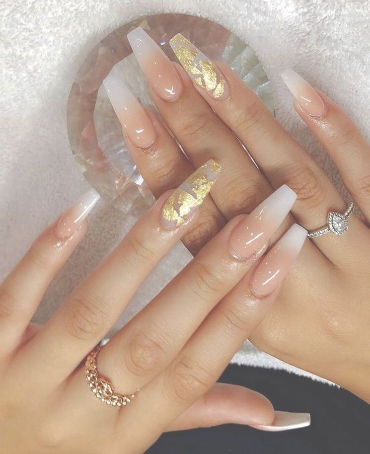 Elegant Ombre Nail Design with Metallic Accents and Gold Foil for Any Occasion.