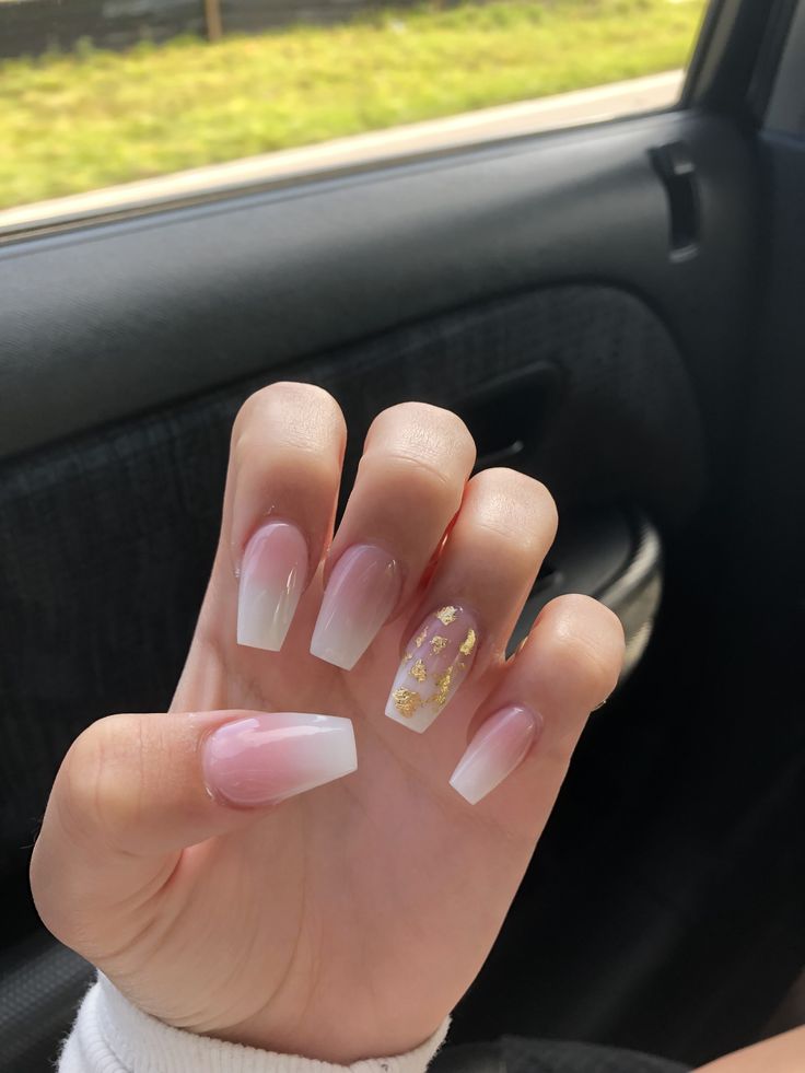 Sophisticated Pink and White Nail Design with Glamorous Golden Accent.