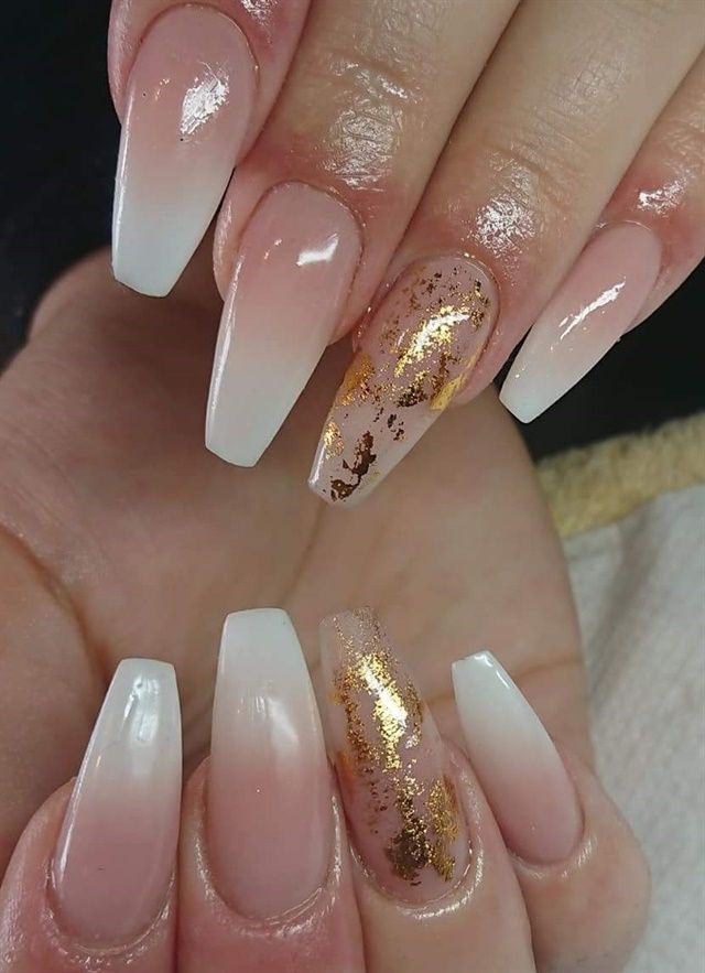 Sophisticated Ombre Nails with Gold Foil for a Glamorous Touch.