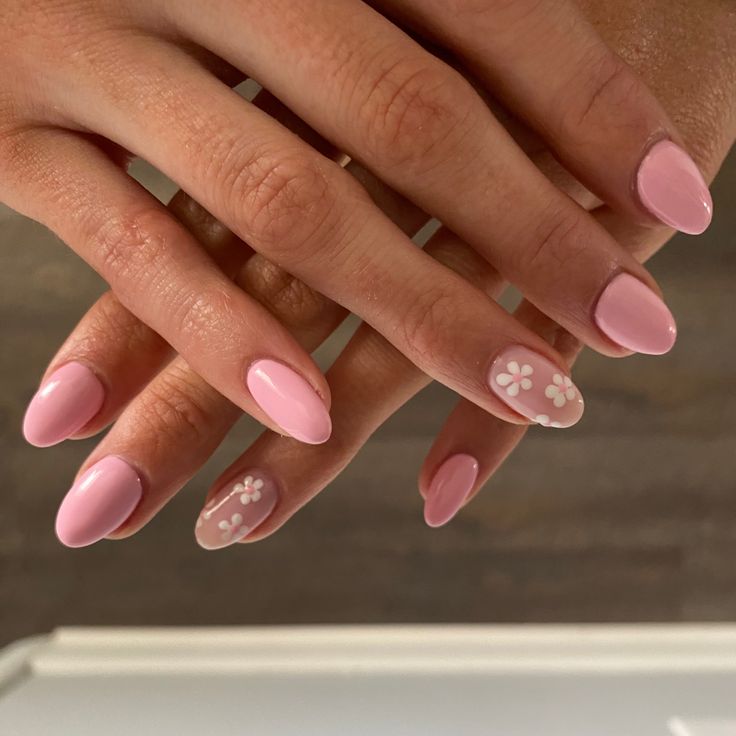 Chic Pink Nail Design with Floral Accents