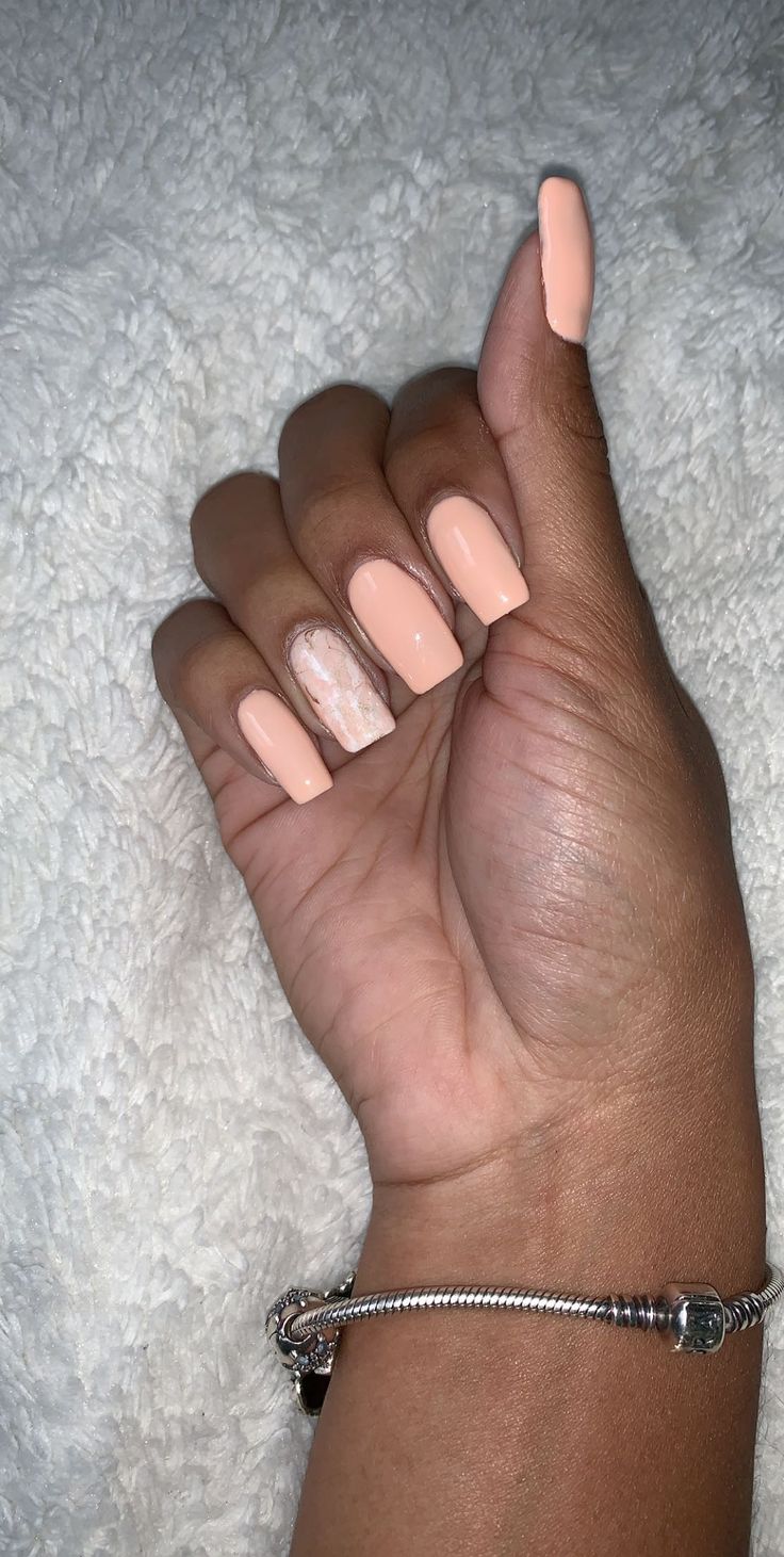 Sophisticated Soft Peach Nail Design with Marbled Accent for Everyday Elegance