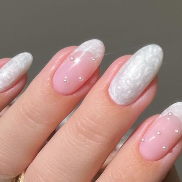 Refined Feminine Nail Design with Soft Pink Base, Glossy White Tips, and Lace-Like Detailing.