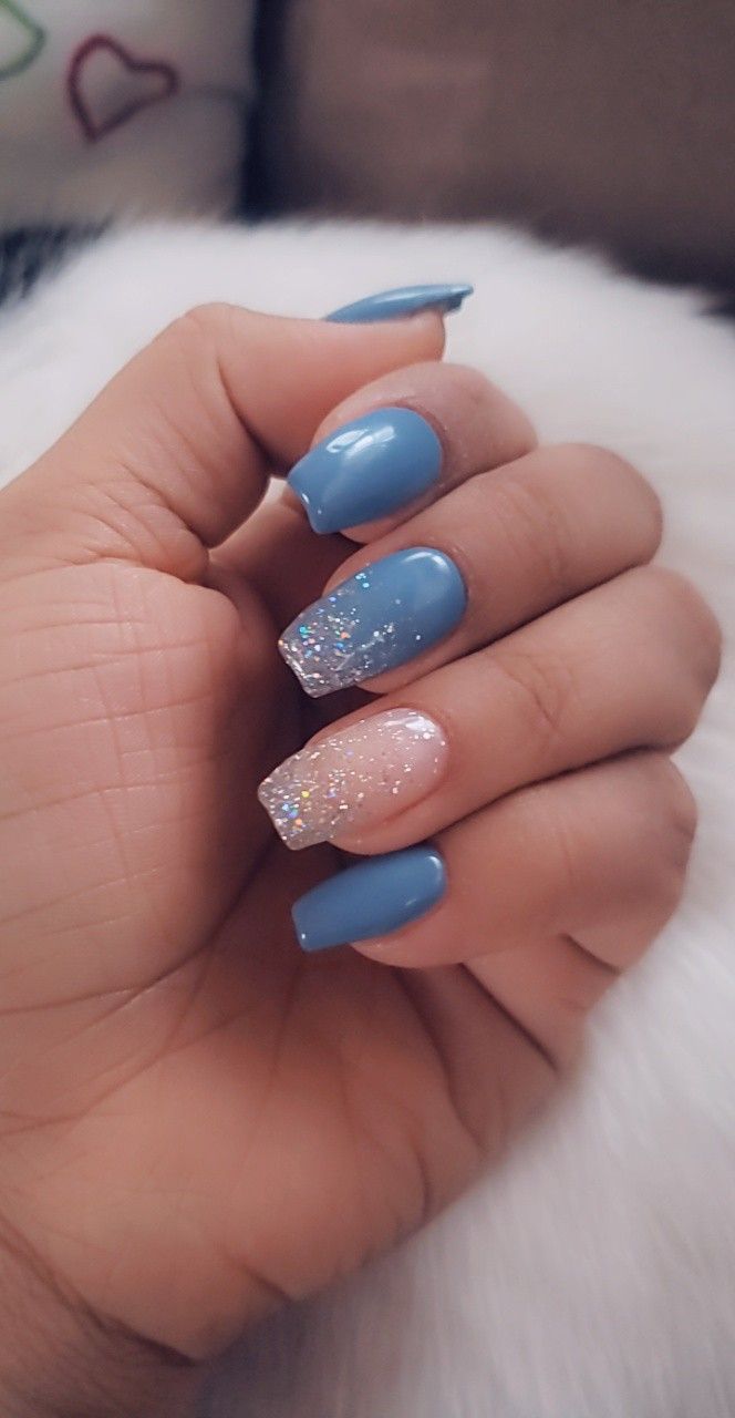 Chic Blue Nail Design with Glitter Gradient and Sophisticated Accents.