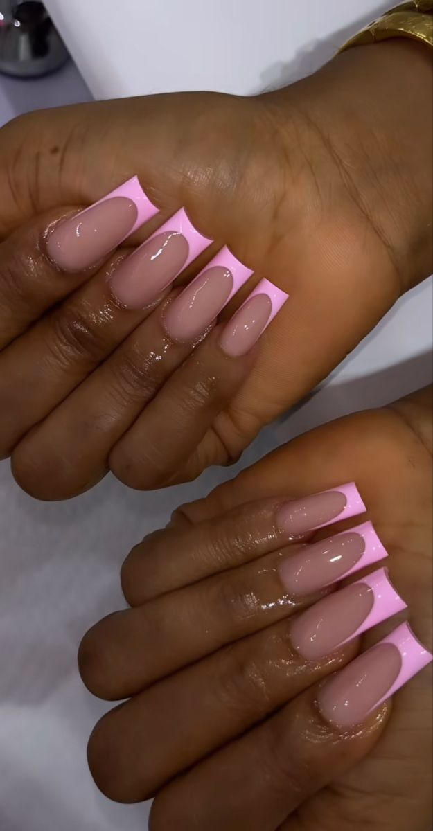 Chic Nude and Pink Nail Design: Elegant Shape Meets Modern Playfulness.