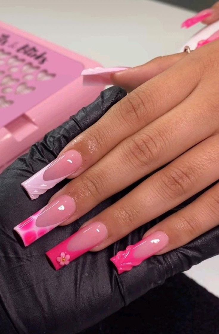 Trendy Pink Gradient Long Nails with Playful Designs and Floral Accents