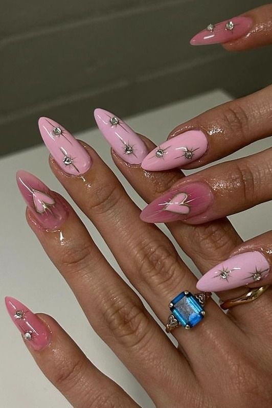 Chic Soft Pink Gradient Stiletto Nails with Delicate Silver Accents and Gems