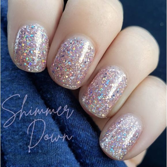 Stunning Glittery Pink Nail Design: Playful Elegance with Shimmering Finish.