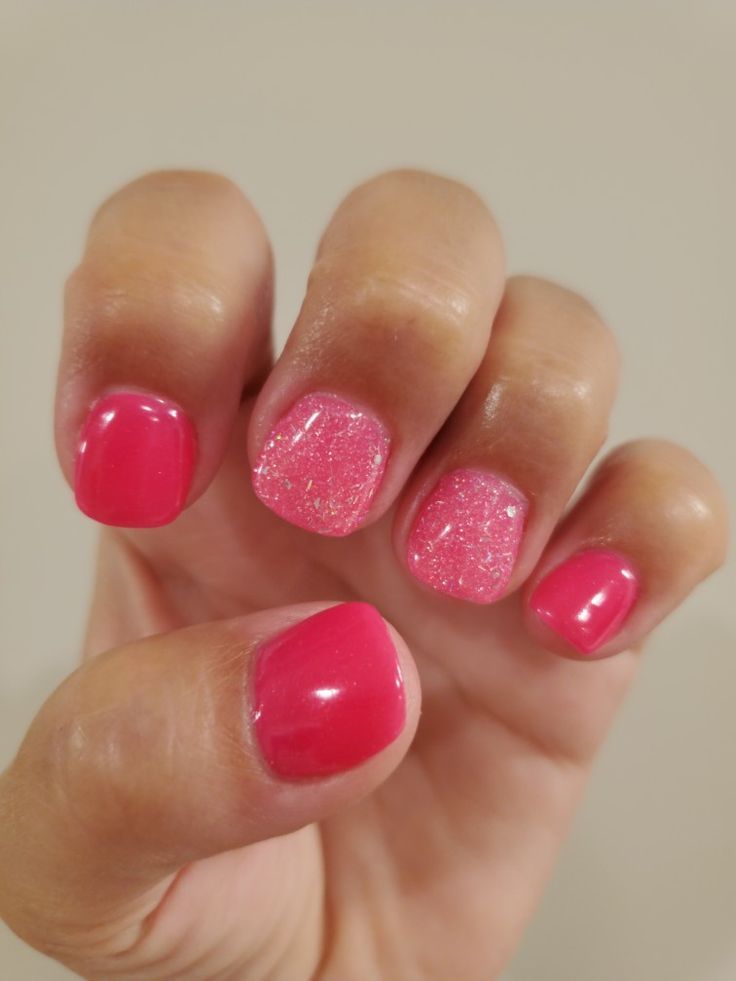 Chic Vibrant Pink Nail Design with Glossy and Glitter Finishes for Every Occasion.