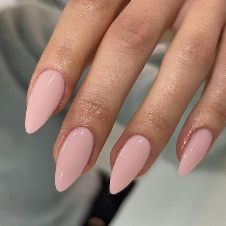 Chic Almond-Shaped Nails with Soft Pink Polish: Perfect for Any Occasion