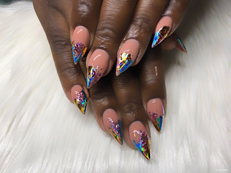 Elegant Stiletto Nails with Holographic Foil Accents and Vibrant Tips.