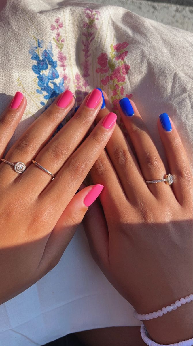 Playful Vibrant Nail Design with Striking Pink and Blue Contrast