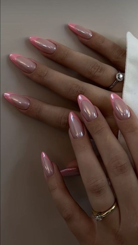 Elegant Nude and Soft Pink Gradient Nail Design with Almond-Shaped Tips for Chic Versatility.