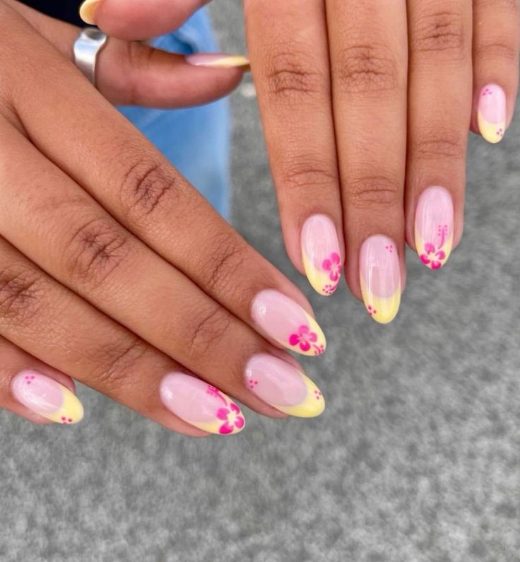 Charming Floral Nail Design: Soft Pink to Sunny Yellow Gradient with Delicate Flowers and Dots.