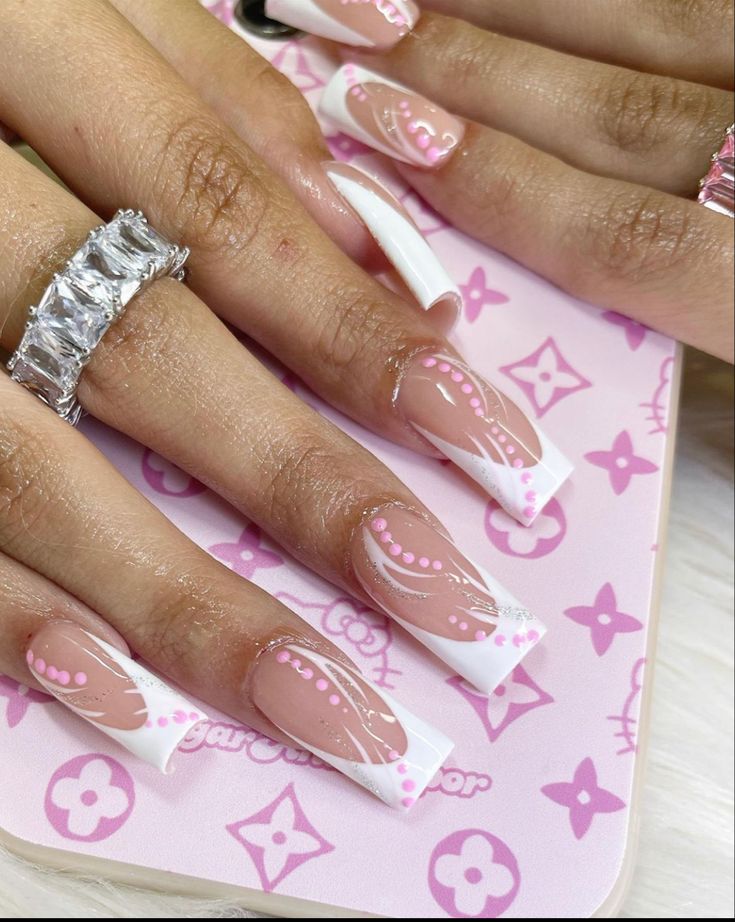 Whimsical Elegance: Soft Nude Nail Design with White Tips and Pink Detailing