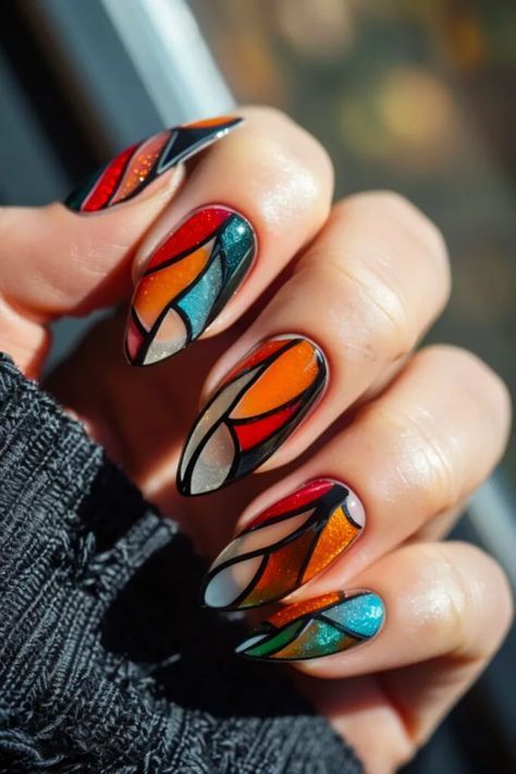 Bold Stained Glass-Inspired Nail Art with Glossy Finish and Vibrant Colors.