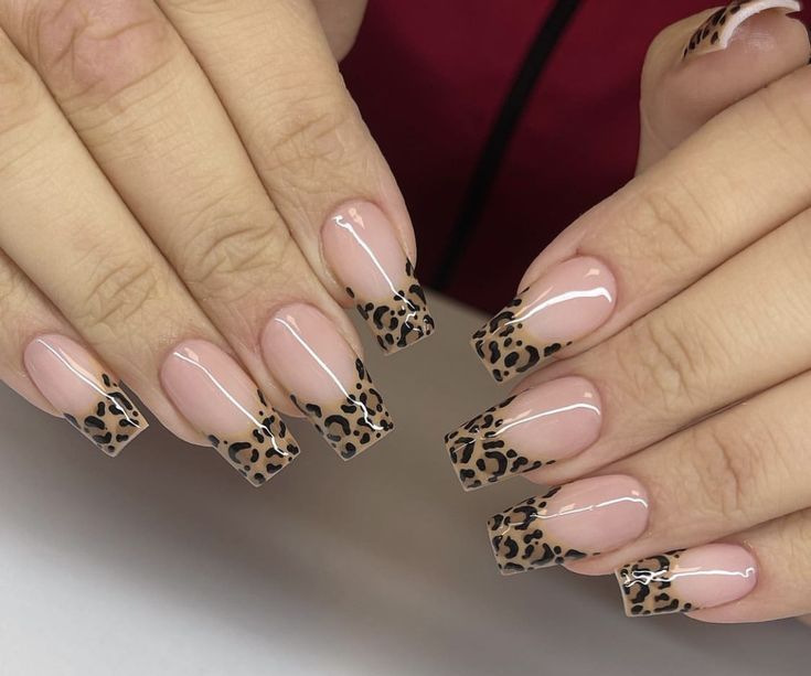 Chic Two-Tone Nail Design: Elegant Nude Base with Wild Leopard Print Tips