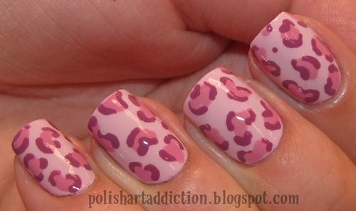 Chic Leopard Print Nail Design: Soft Pink Base with Darker Pink Spots.