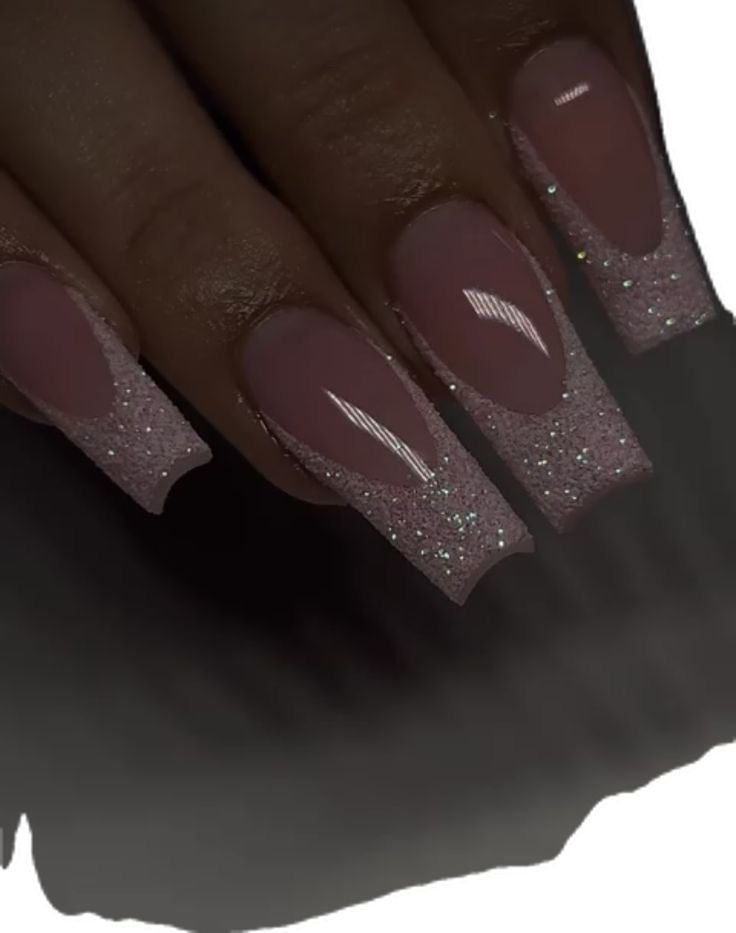 Elegant Glistening Ombre Nails: Nude Base with Sparkling Pink Glitter Tips