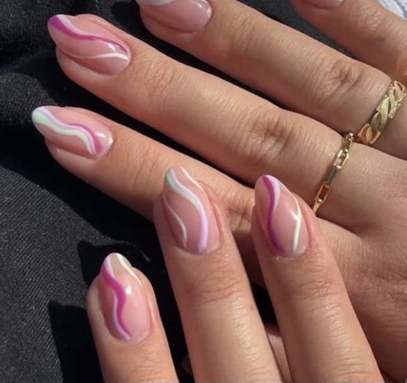 Elegant Wavy Pink and White Nail Design for Sophisticated Style.