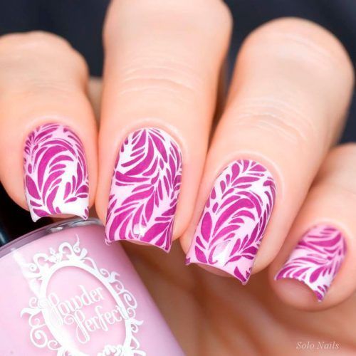 Elegant Pink and White Floral Nail Design with Intricate Leaf Motifs