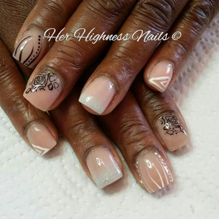 Chic Elegance: Soft Nude Nail Design with Floral Patterns and Glitter Accents