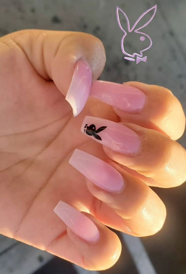 Sophisticated Long Square Nails in Soft Pink with Black Graphic Accents for a Playful Elegance.