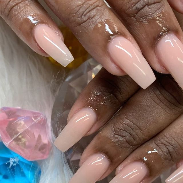 Sophisticated Square-Shaped Nude Acrylic Nails with Colorful Gem Accents