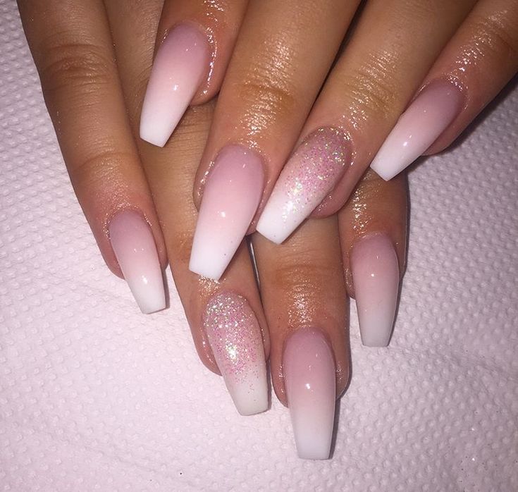 Elegant Chic Ombre Nails: Soft Pink to White Gradient with Sparkling Accents for Special Occasions.